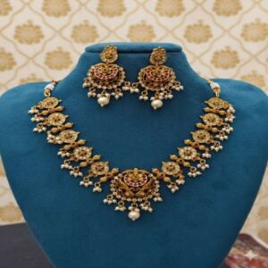Gold-plated South Indian necklace with traditional handcrafted design.